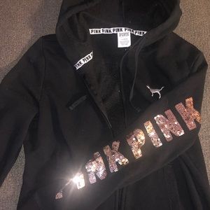 Sparkly gold and silver on a black hoody.